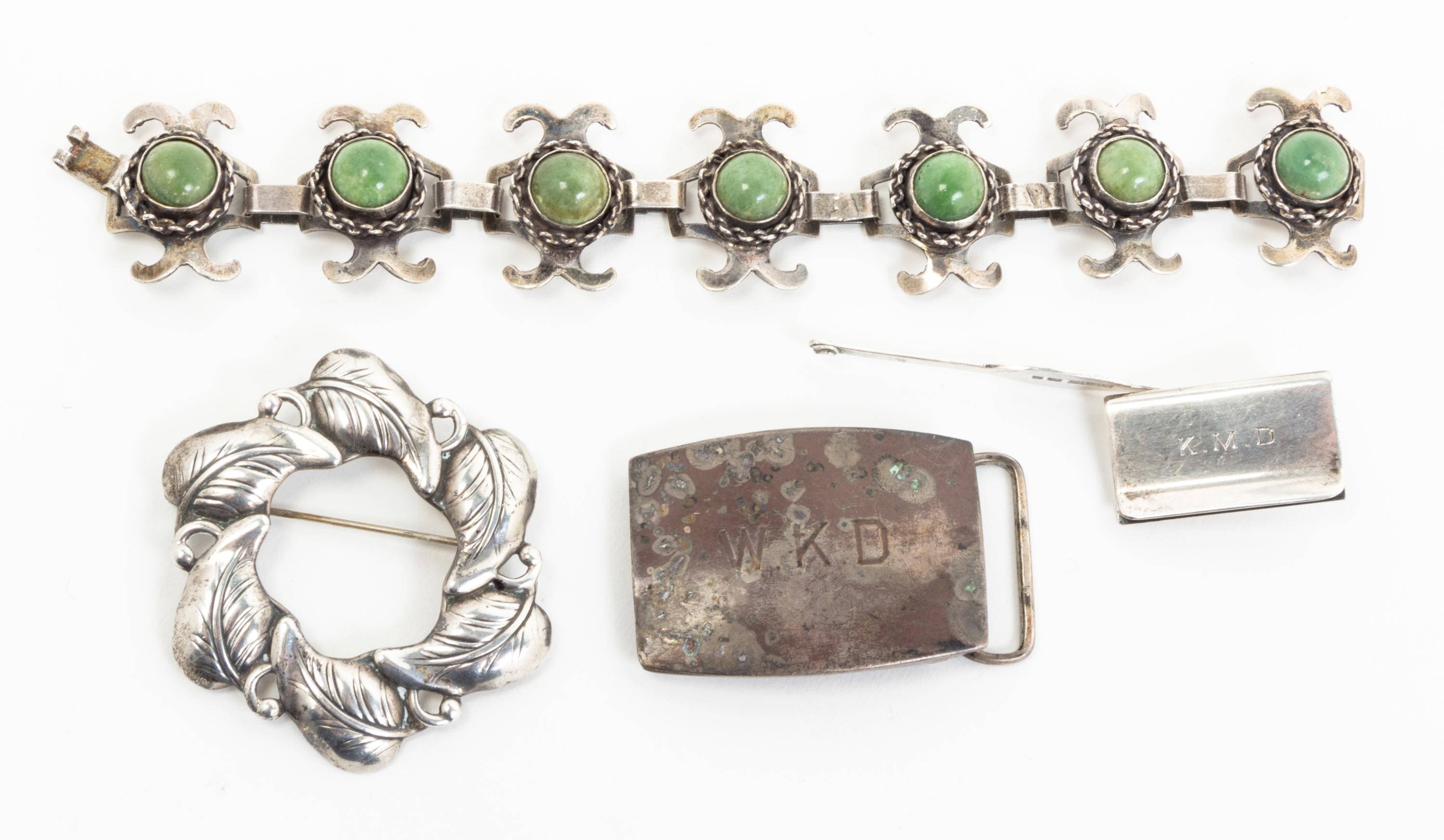 A Group of Four Silver Accessories, , including a buckle, two pins, and a Mexican silver and hardstone bracelet.