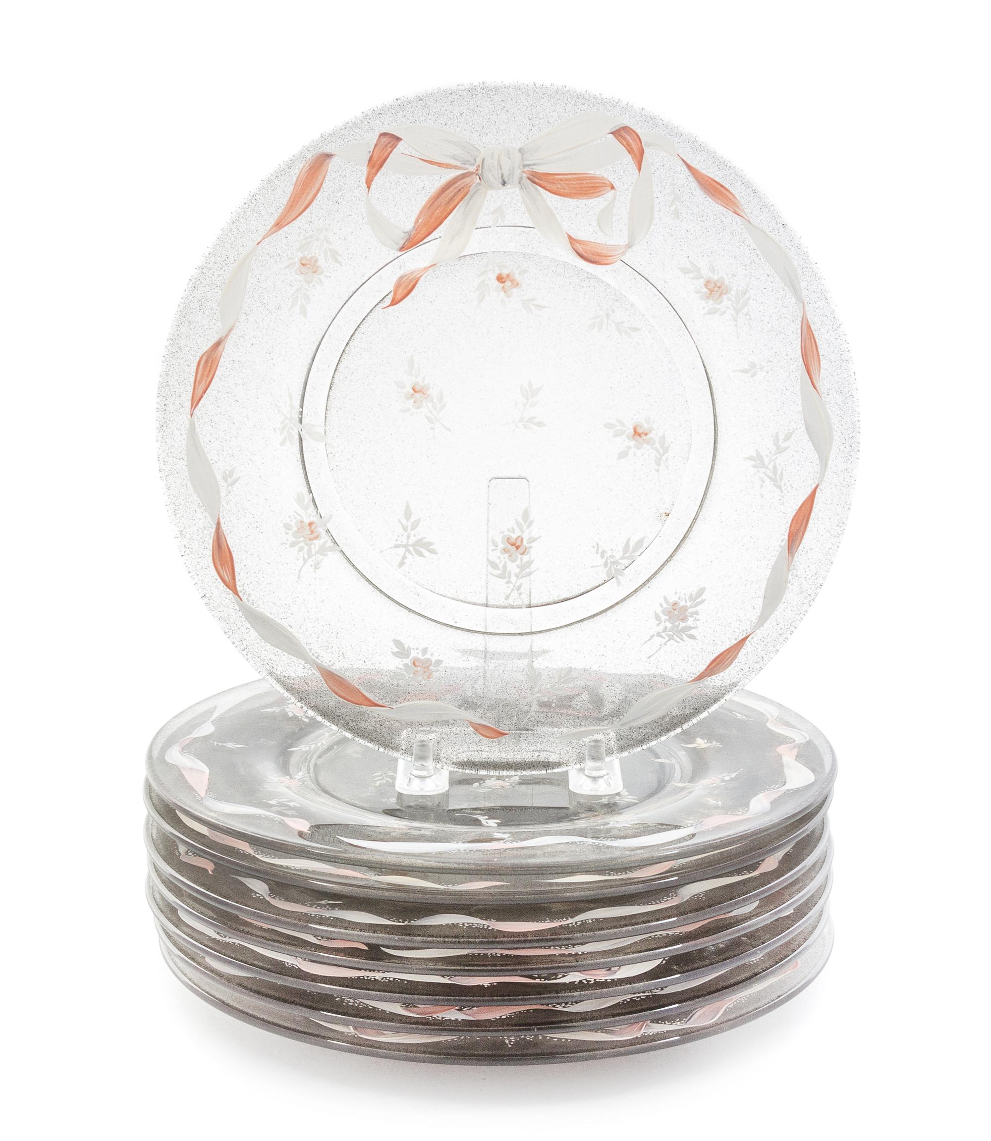 A Set of Eight Enameled Glass Plates Diameter 8 1/4 inches.