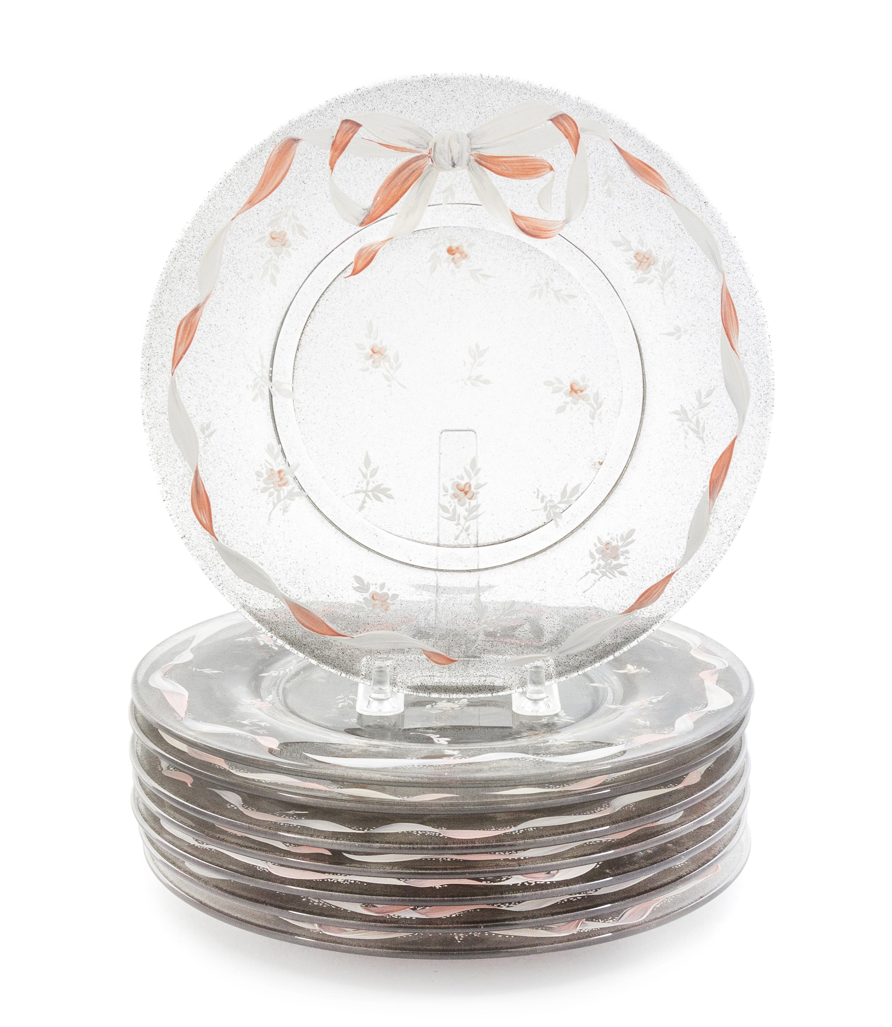 A Set of Eight Enameled Glass Plates Diameter 8 1/4 inches.