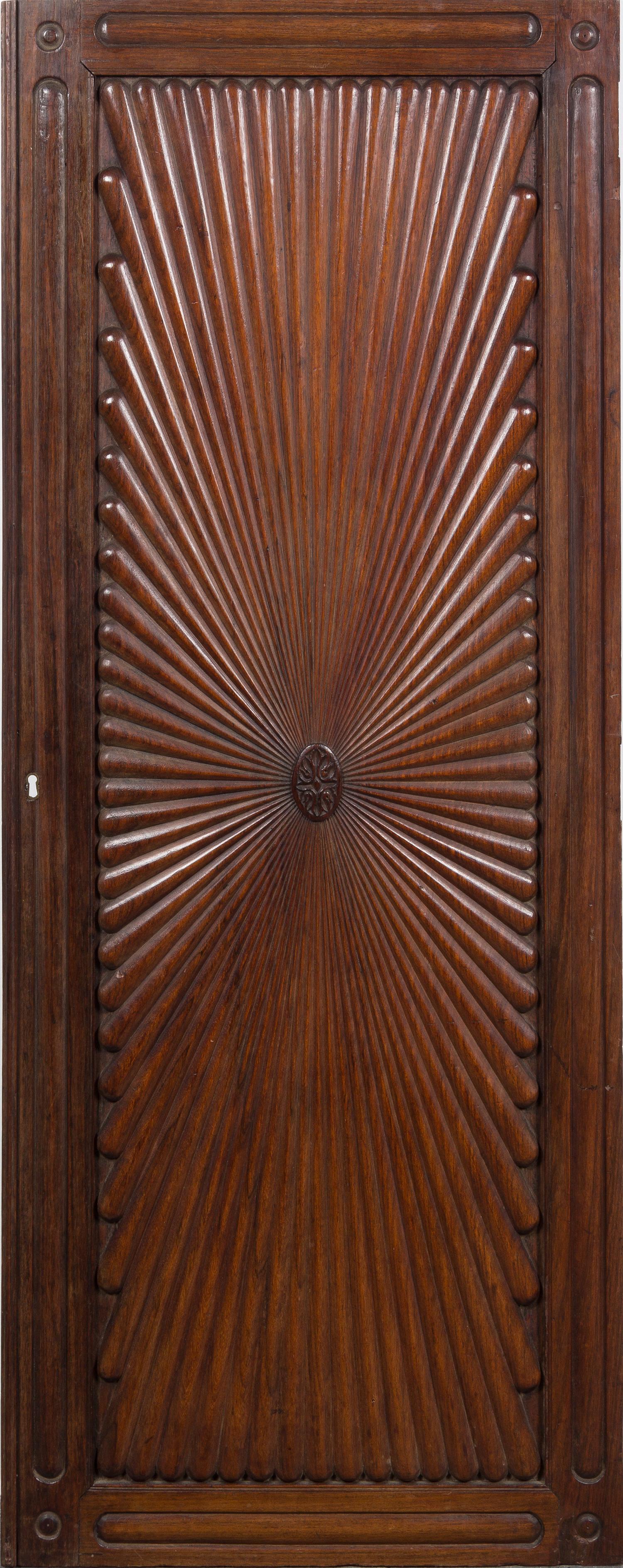 A Carved Mahogany Door Height 61 1/2 x width 24 inches. — 19TH CENTURY