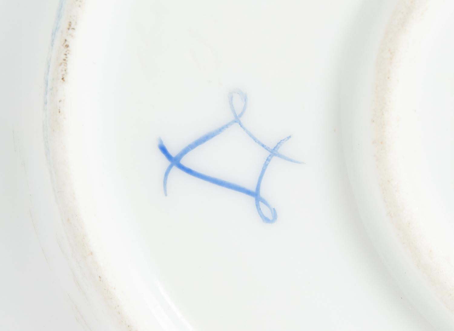 A Pair of Sèvres Style Porcelain Tureens and Underplates