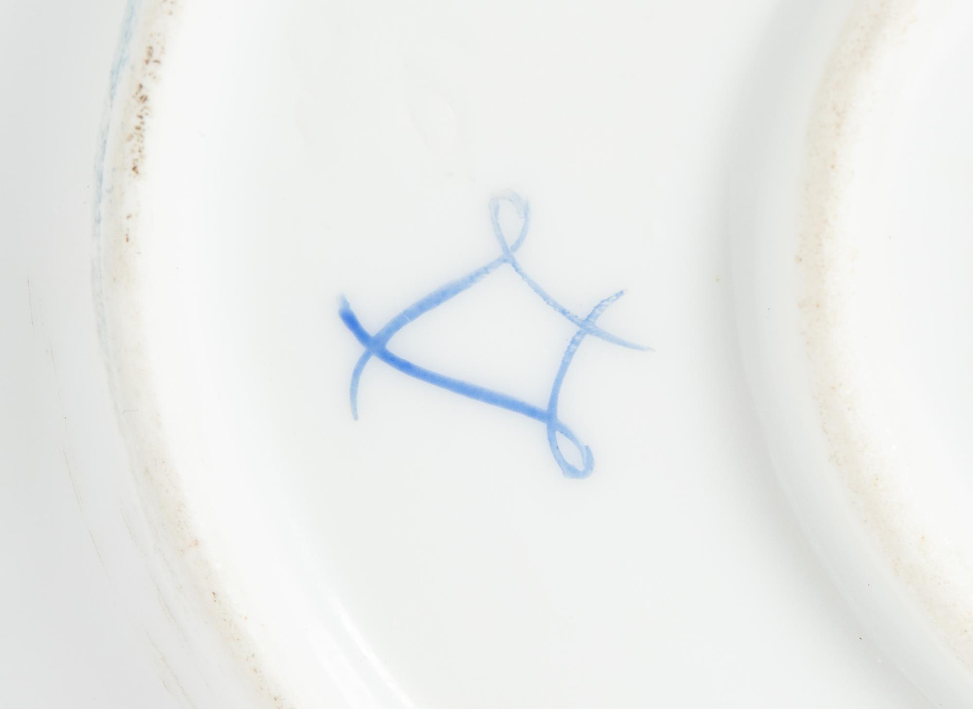 A Pair of Sèvres Style Porcelain Tureens and Underplates