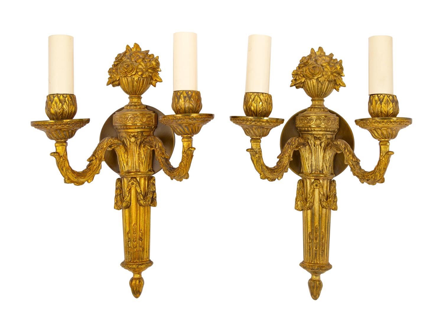 A Pair of Continental Gilt Metal Two-Light Sconces