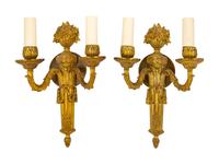 A Pair of Continental Gilt Metal Two-Light Sconces