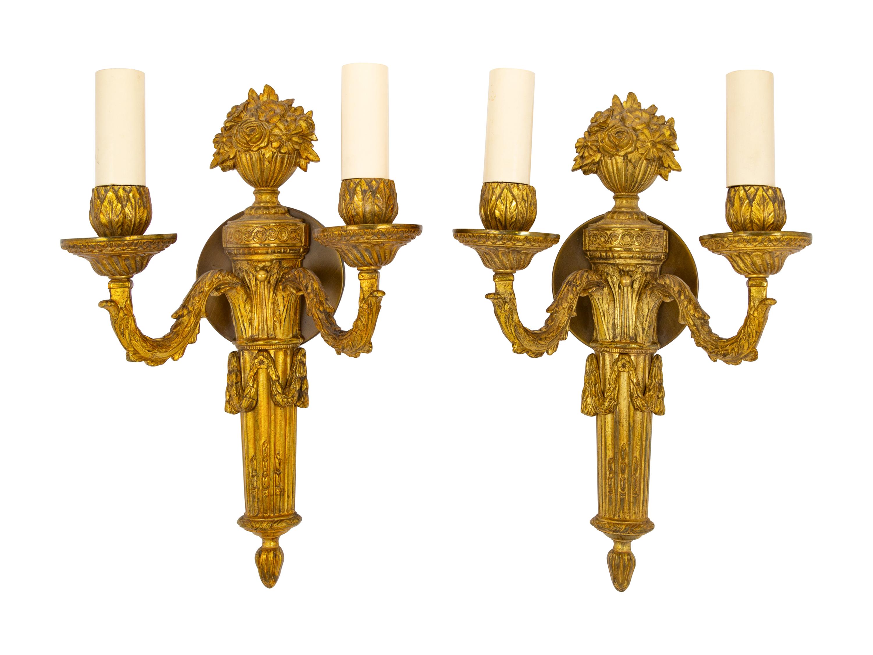 A Pair of Continental Gilt Metal Two-Light Sconces