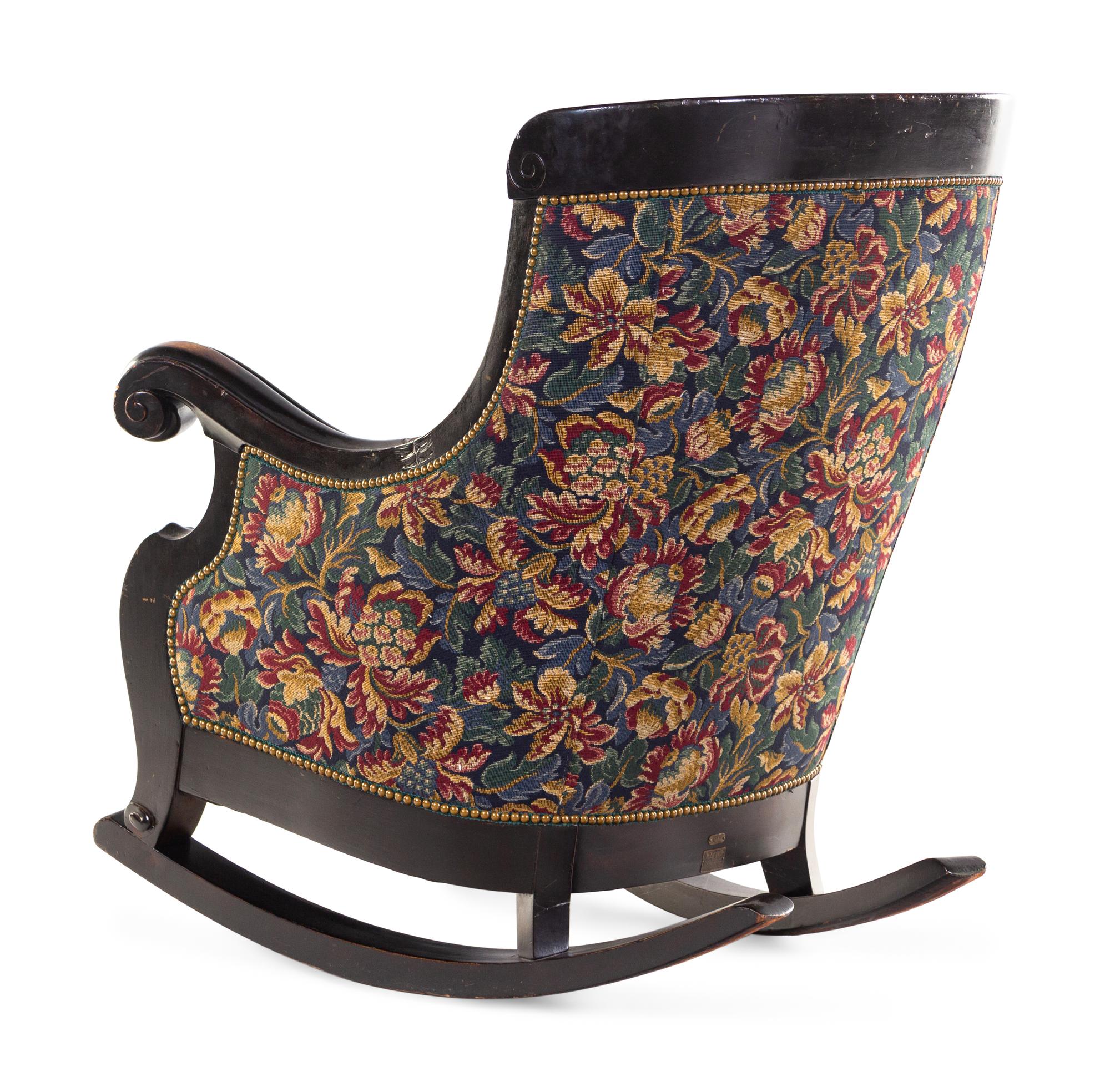 A Karpen Carved Mahogany Rocker