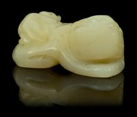A Carved Jade Toggle Length 1 3/4 inches.