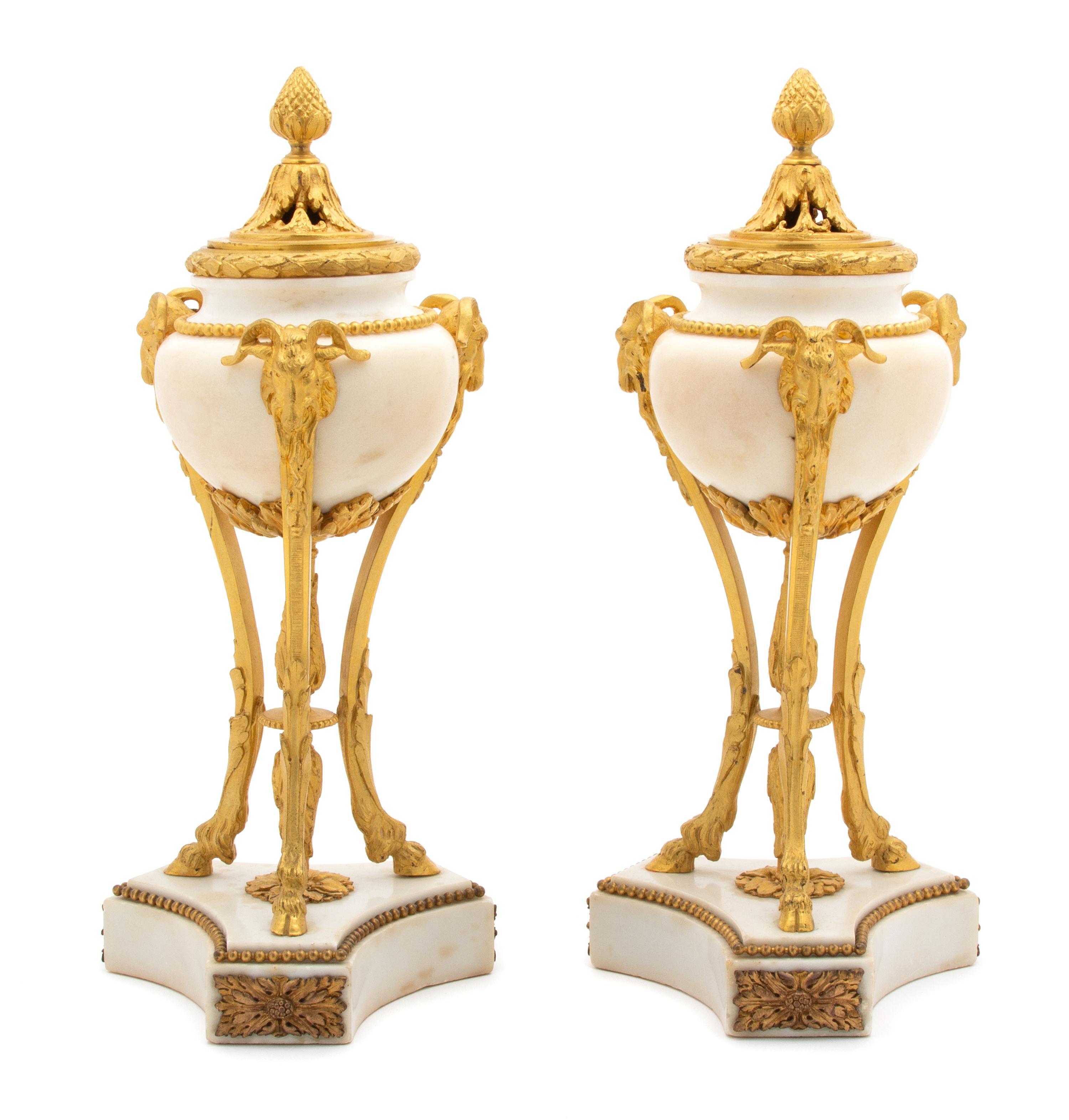 A Pair of Louis XVI Style Gilt Bronze Mounted White Marble Urns Height 12 7/8 inches. — 19TH CENTURY