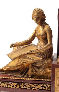A Louis XVI Style Gilt Bronze and Rouge Griotte Marble Mantel Clock