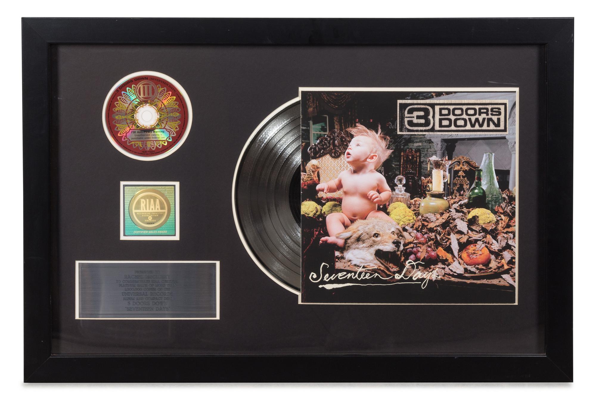 A Three Doors Down RIAA Certified Platinum Presentation Album 20 1/2 x 31 inches.