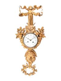 A French Gilt Metal Wall Clock
