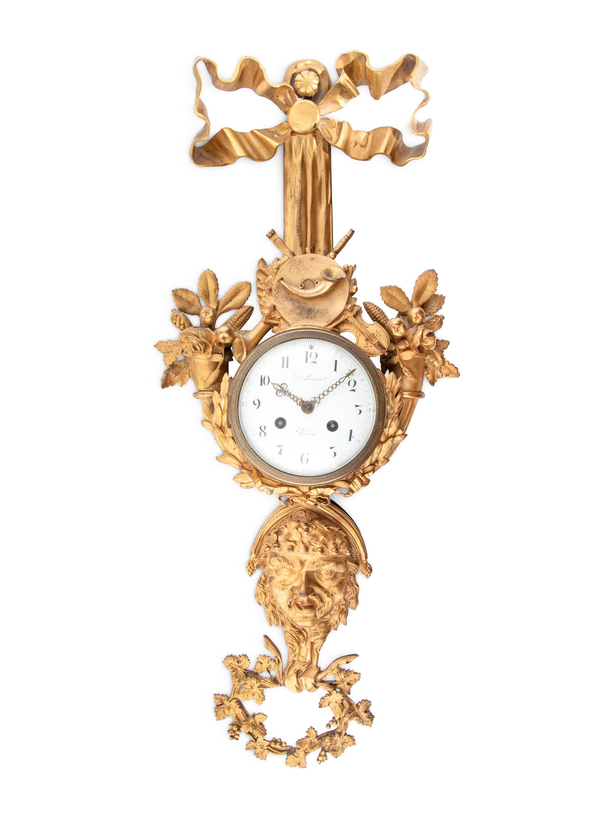 A French Gilt Metal Wall Clock