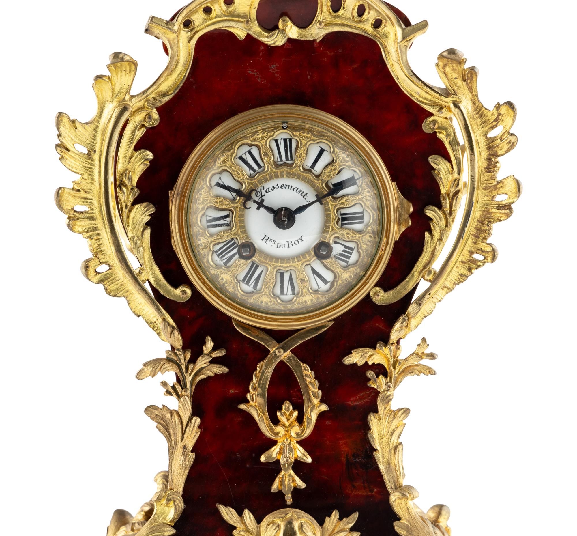 A Louis XV Style Gilt Metal and Faux Tortoise Shell Mantel Clock