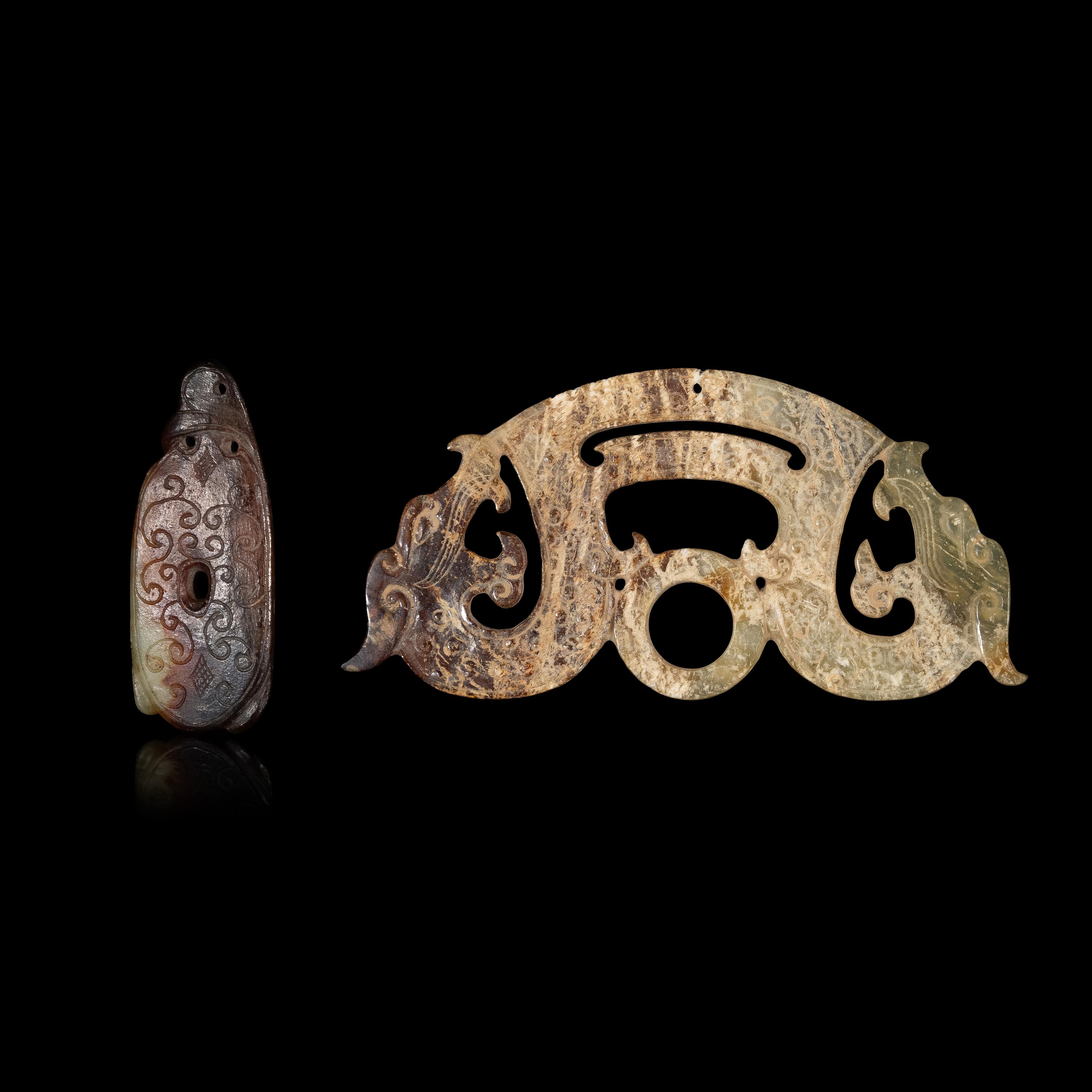 Two Chinese Archaistic Jade 'Dragon' Pendants 仿古玉佩兩件