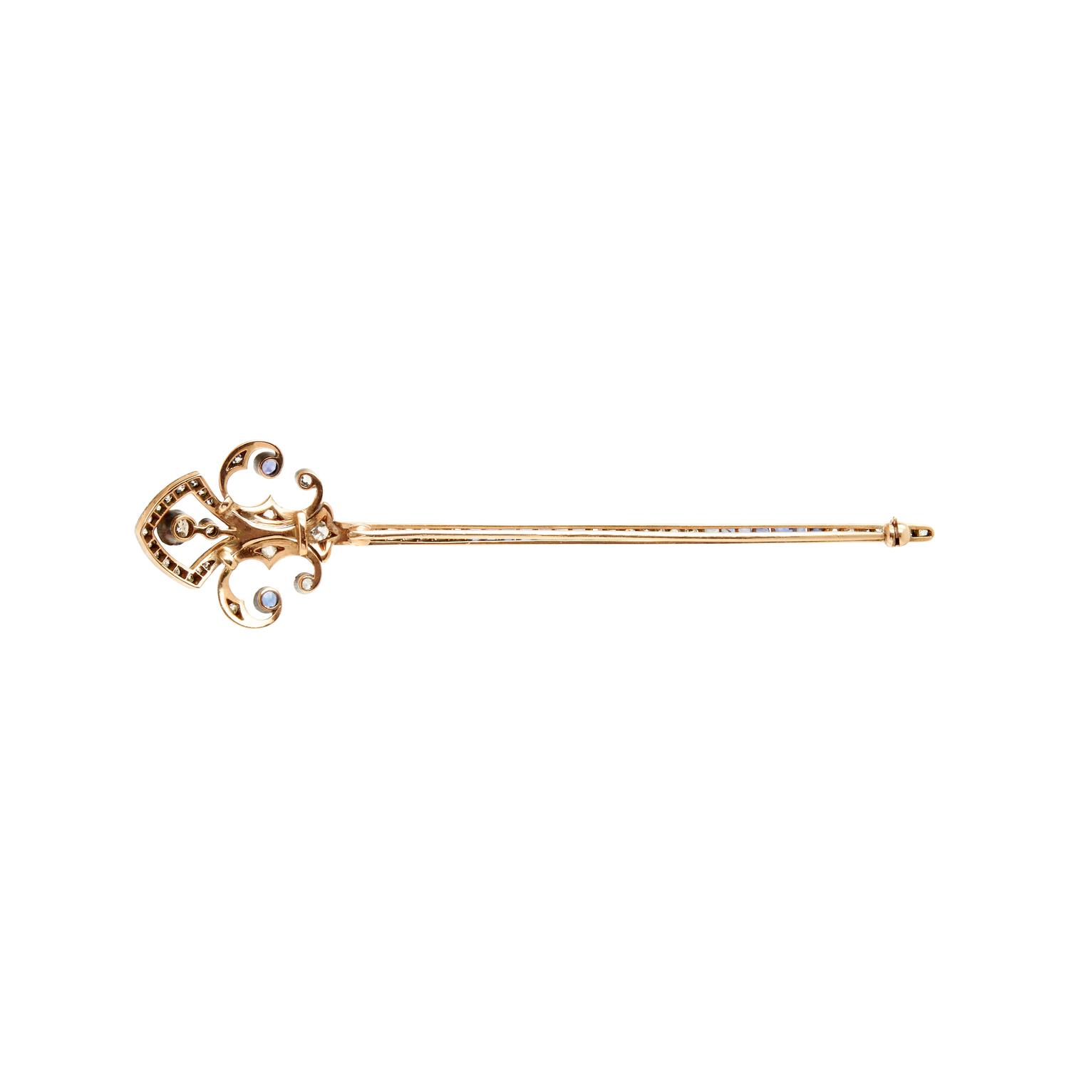 COLLECTION OF YELLOW GOLD AND GEMSTONE PINS