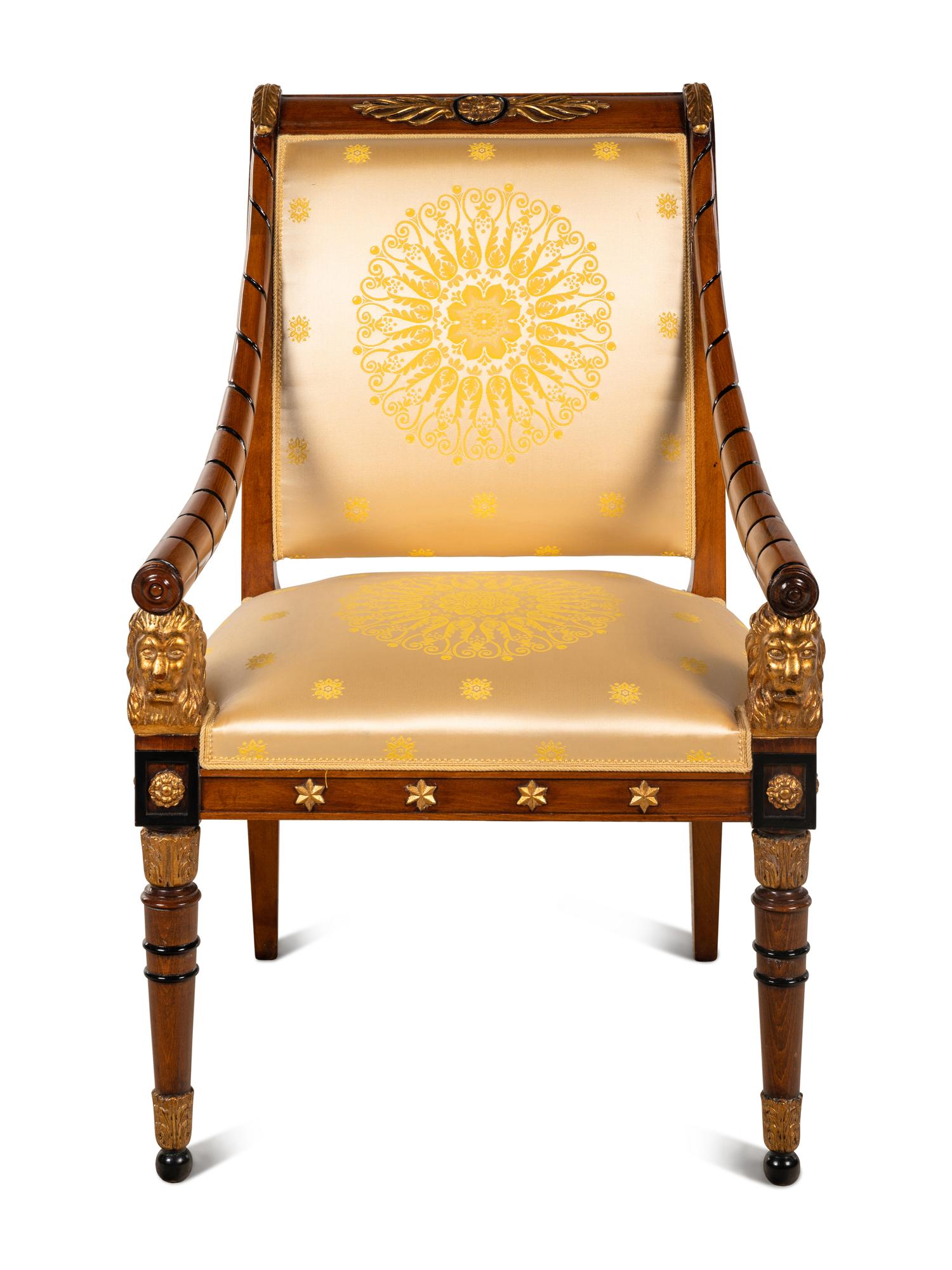 An Empire Style Parcel Gilt and Ebonized Armchair