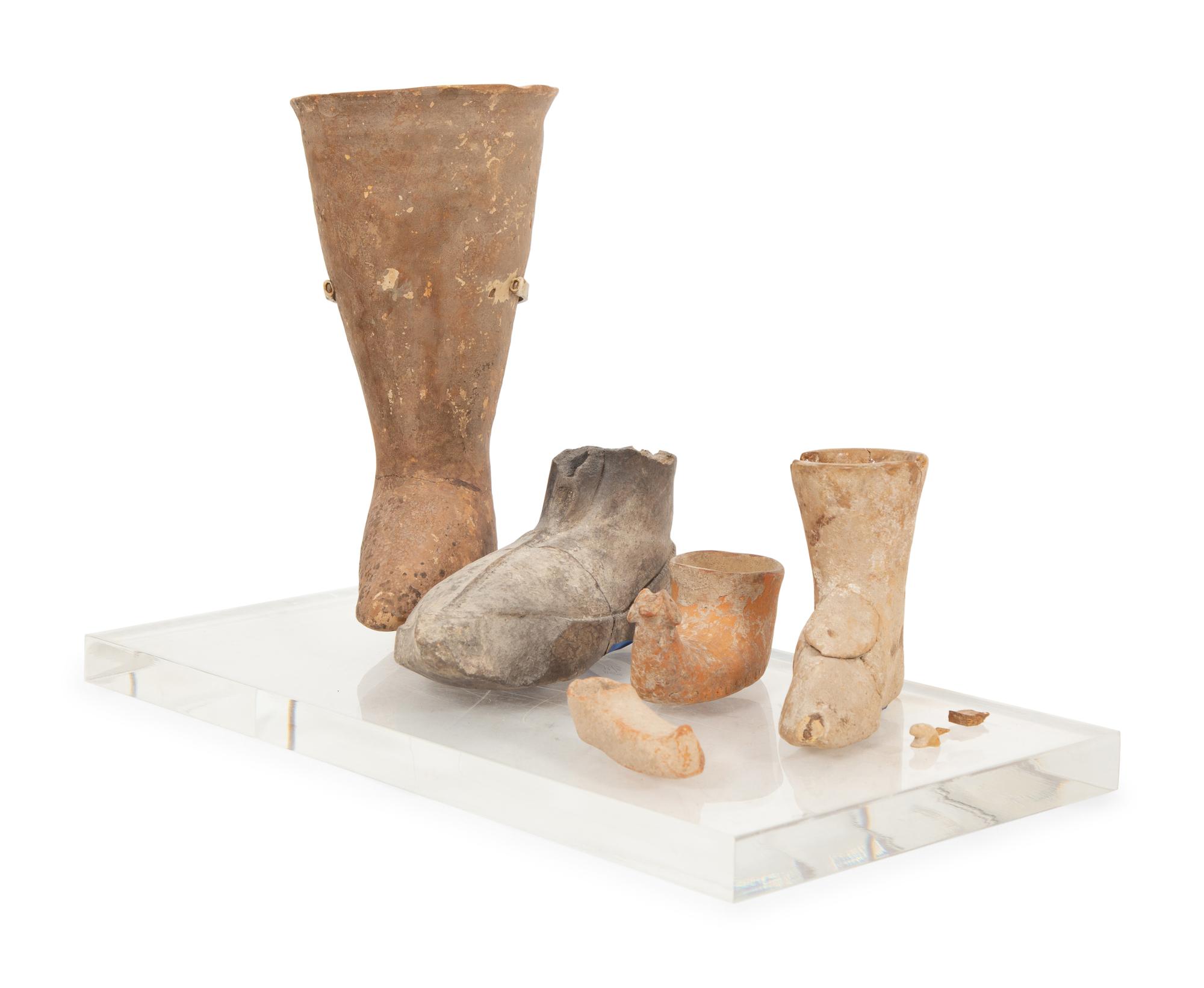 A Group of Earthenware Shoe-Form Drinking Vessels