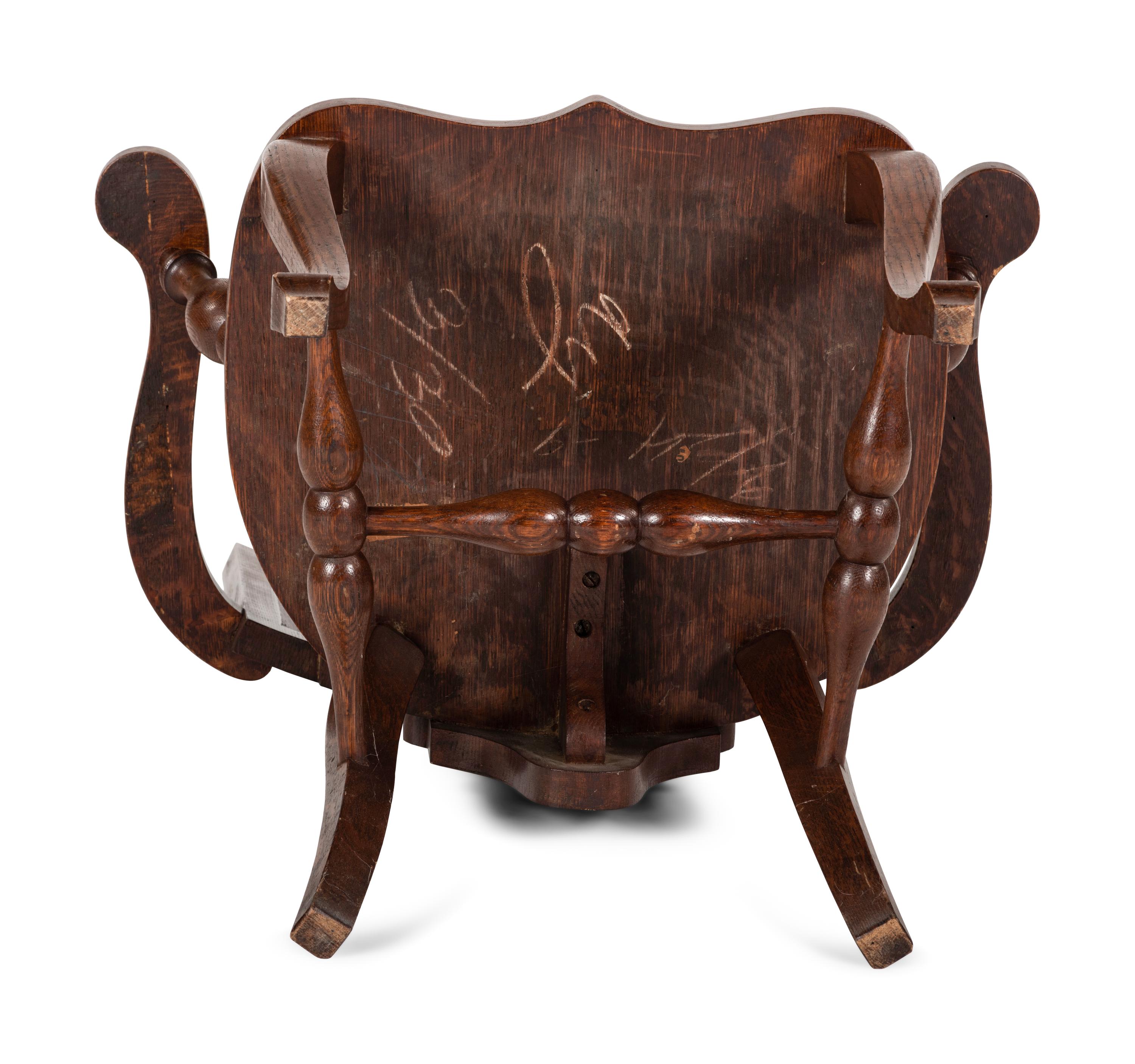 A Folk Art Pressed Oak USS Maine Chair