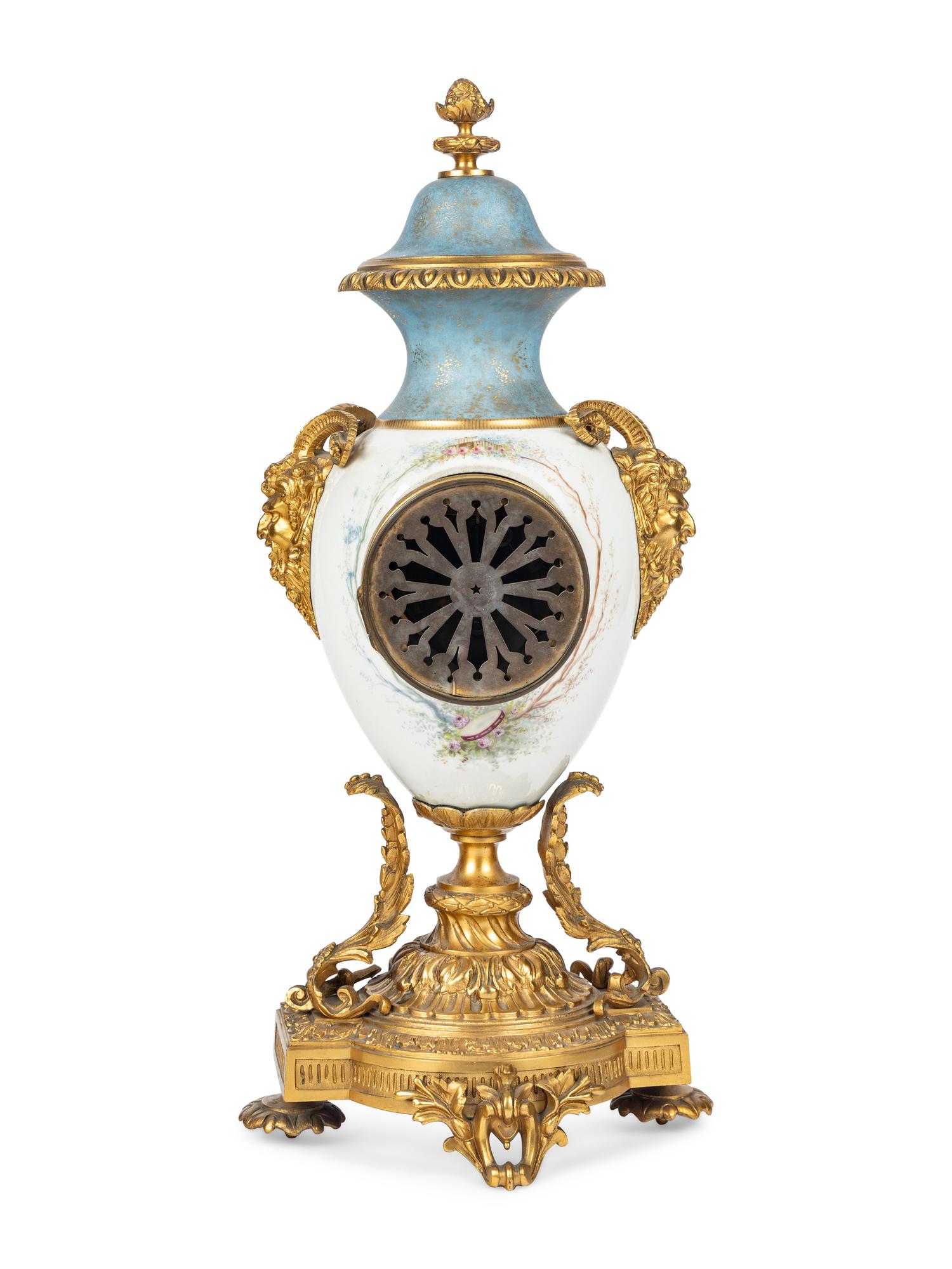 A French Gilt Bronze and Porcelain Urn-Form Clock