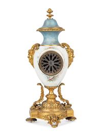 A French Gilt Bronze and Porcelain Urn-Form Clock