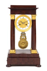 An Empire Gilt Metal Mounted Mahogany Portico Clock Height 18 5/8 inches. — 19TH CENTURY
