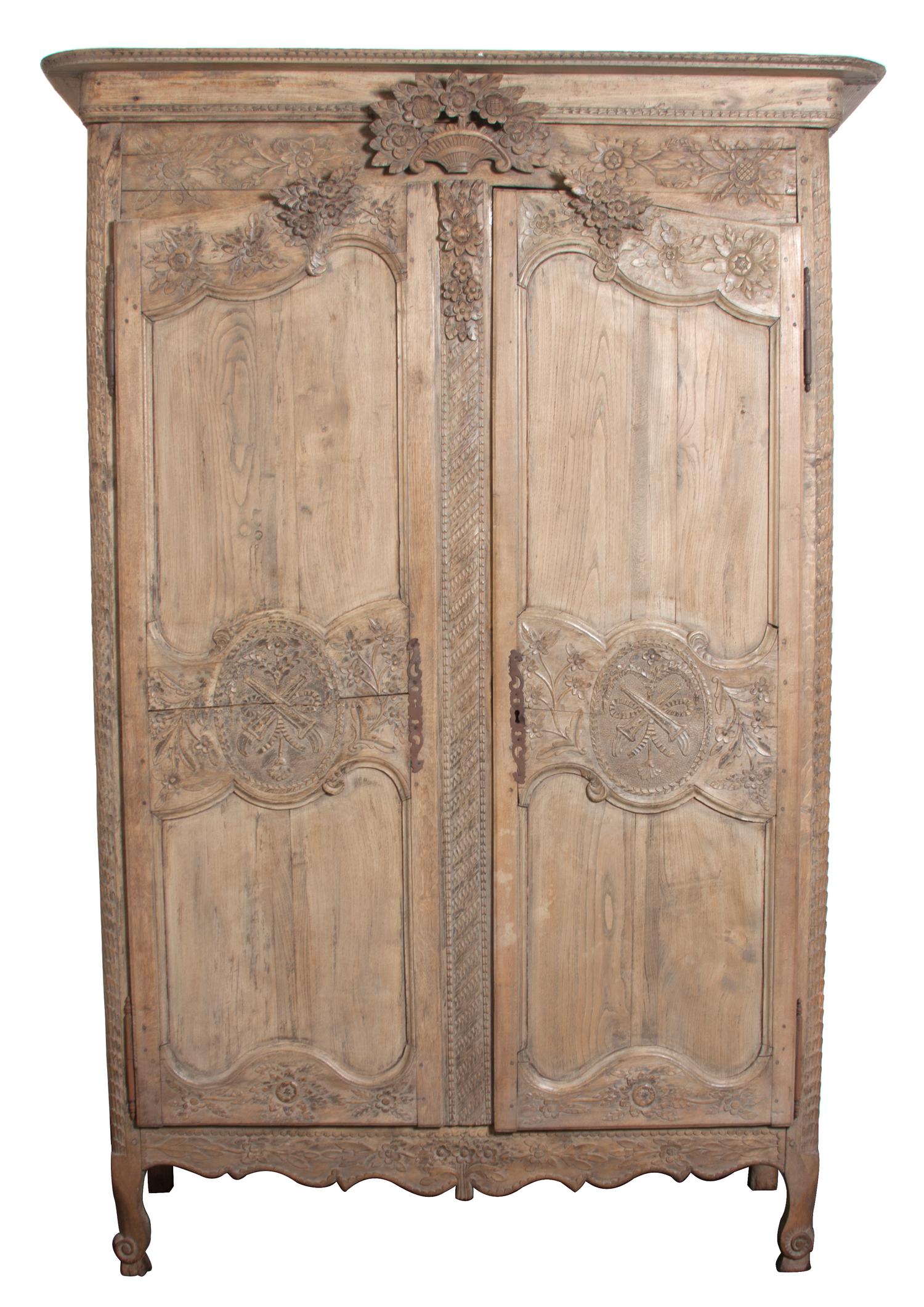 A Louis XV Provincial Pine Armoire Height 88 3/4 x width 55 x depth 24 inches. — 19TH CENTURY