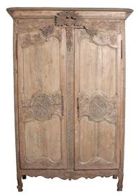 A Louis XV Provincial Pine Armoire Height 88 3/4 x width 55 x depth 24 inches. — 19TH CENTURY