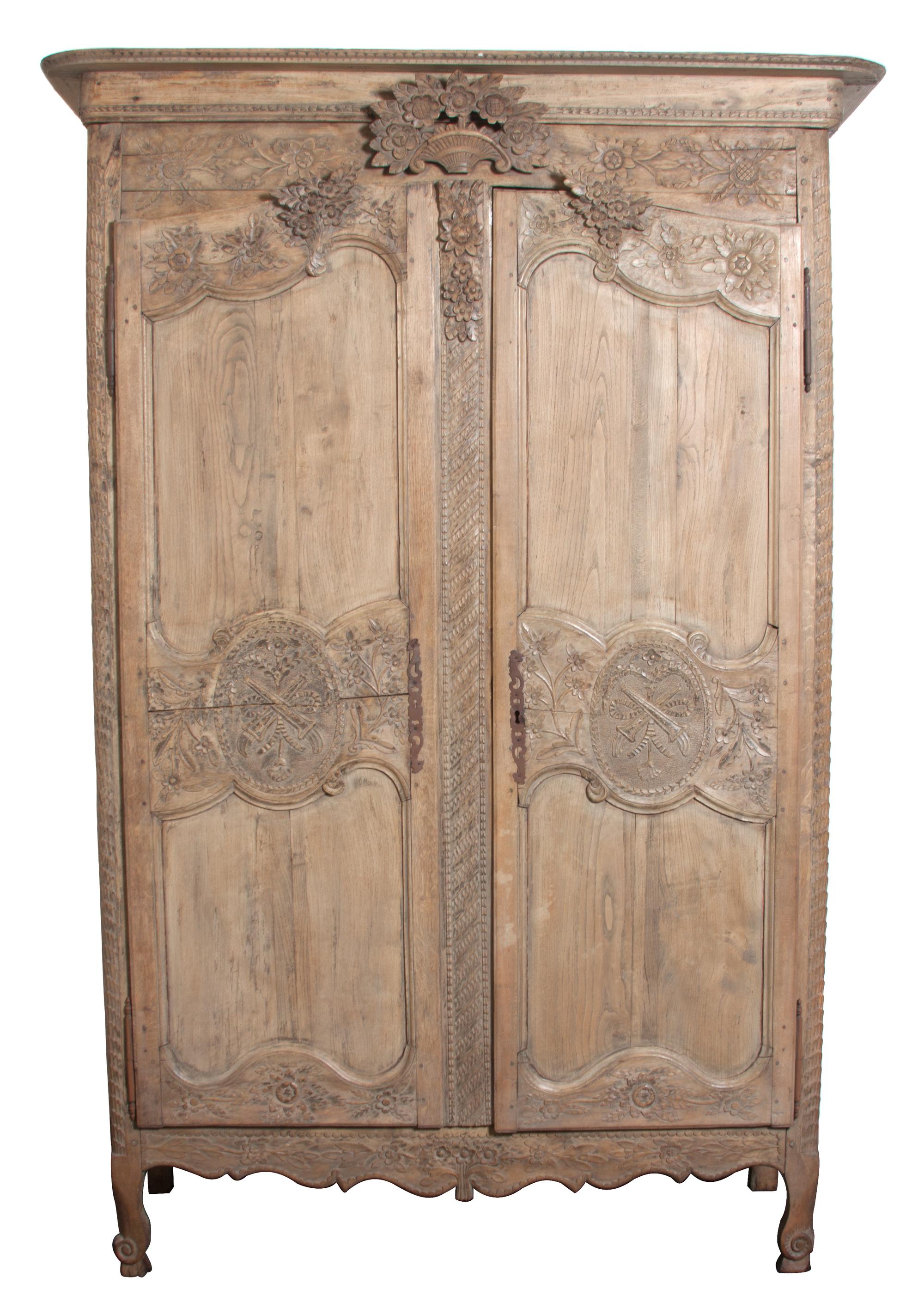 A Louis XV Provincial Pine Armoire Height 88 3/4 x width 55 x depth 24 inches. — 19TH CENTURY