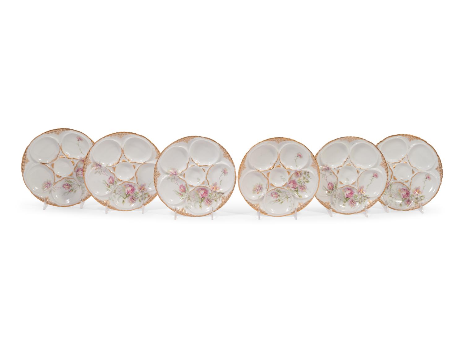 A Set of Six Theodore Haviland Limoges Porcelain Oyster Plates