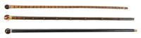 Three Hardstone Mounted Walking Sticks, Height of tallest overall 36 3/8 inches.