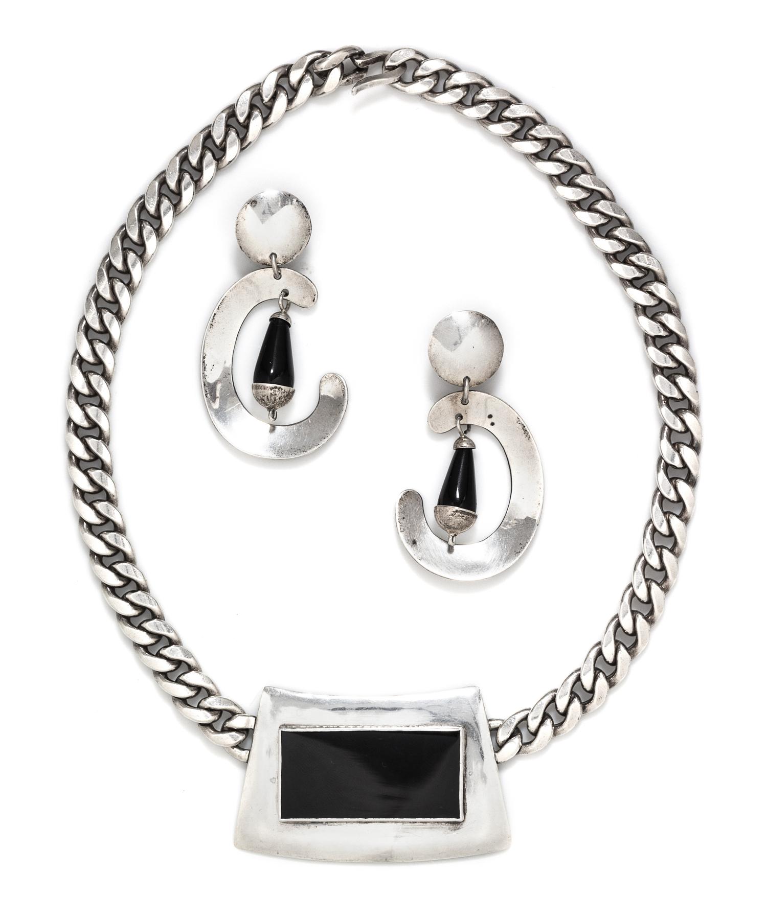 A Collection of Sterling Silver and Onyx Jewelry, 91.50 dwts.