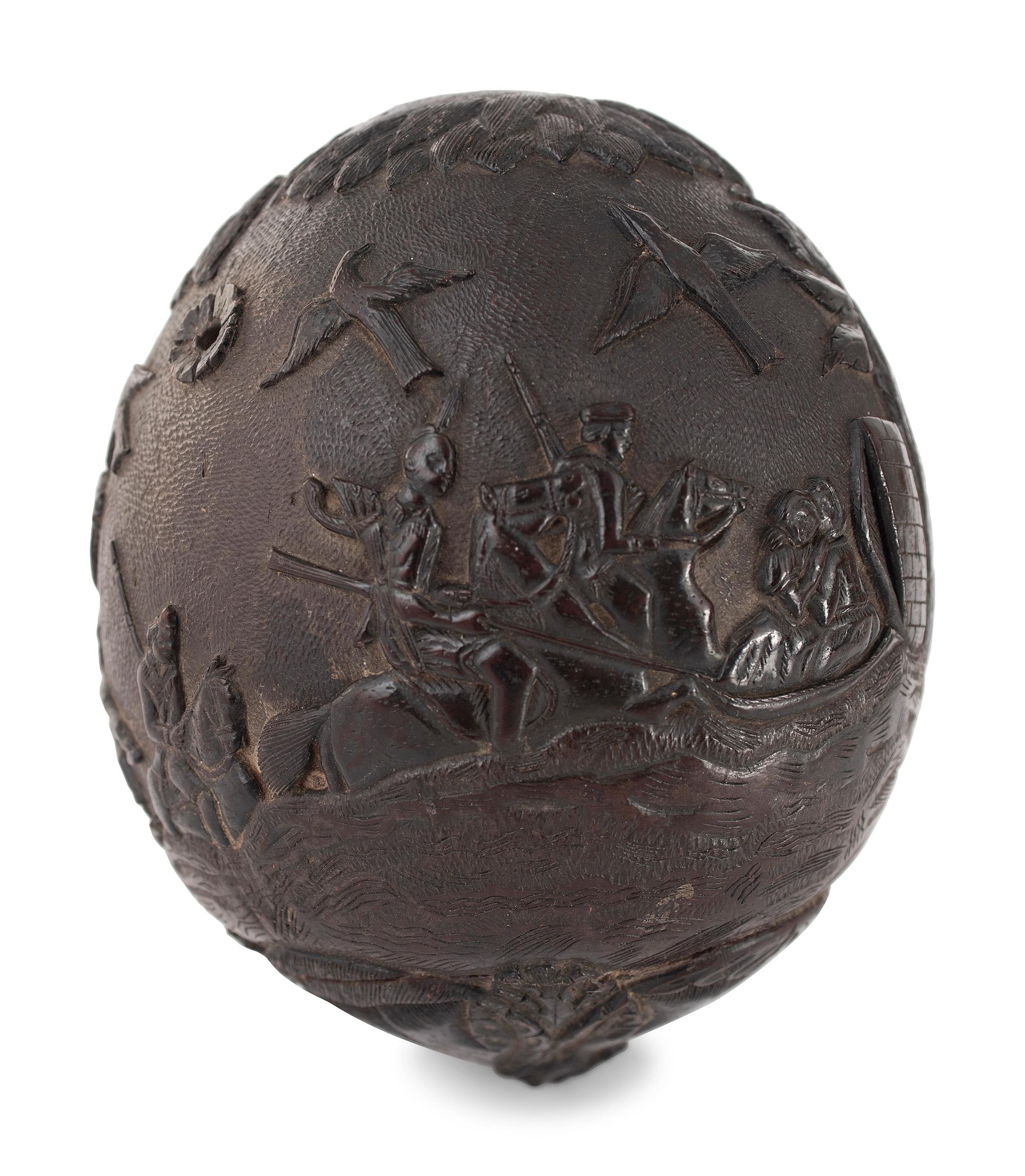 A Carved Coconut Depicting a Grisly American Indian Scene