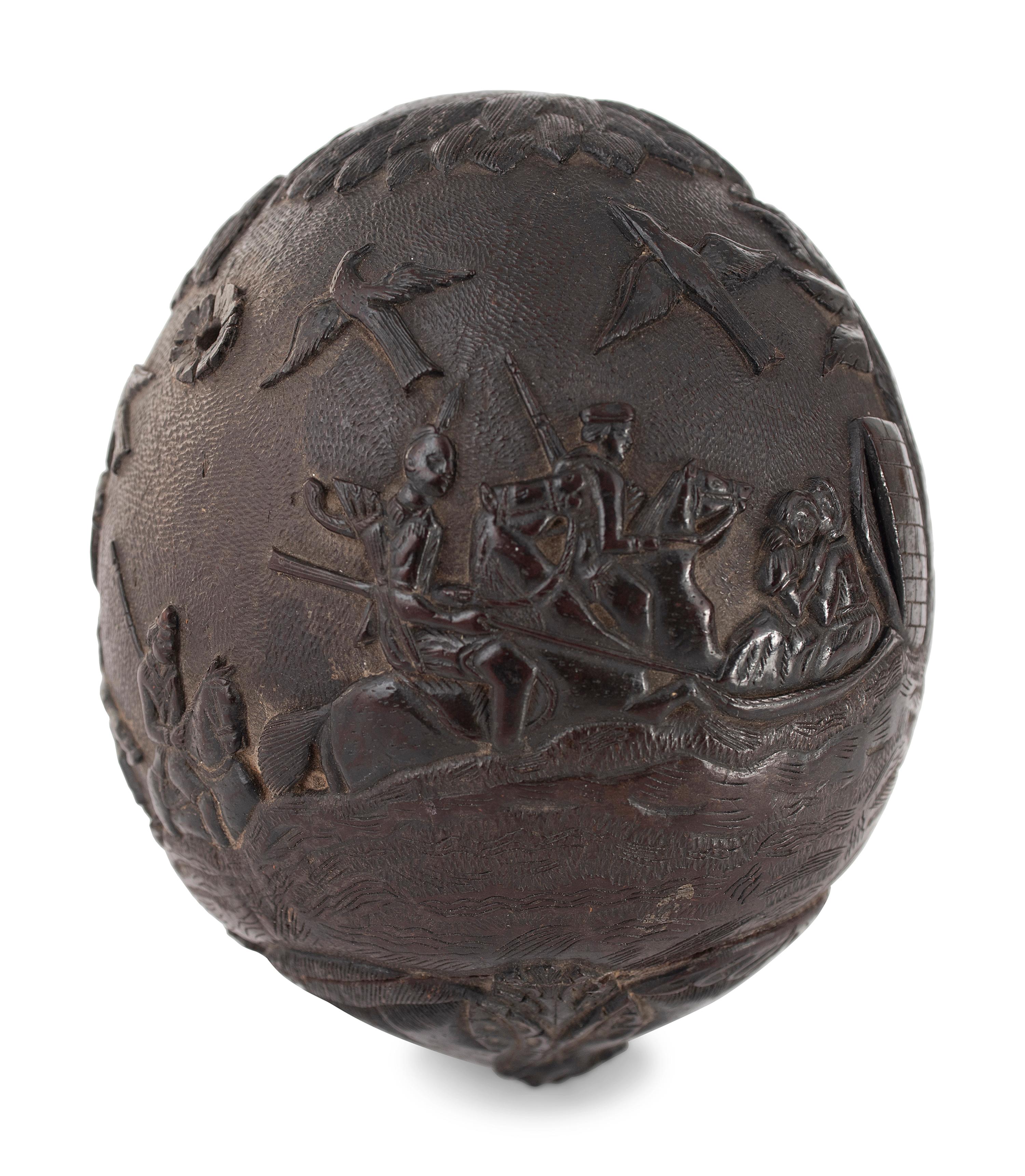 A Carved Coconut Depicting a Grisly American Indian Scene