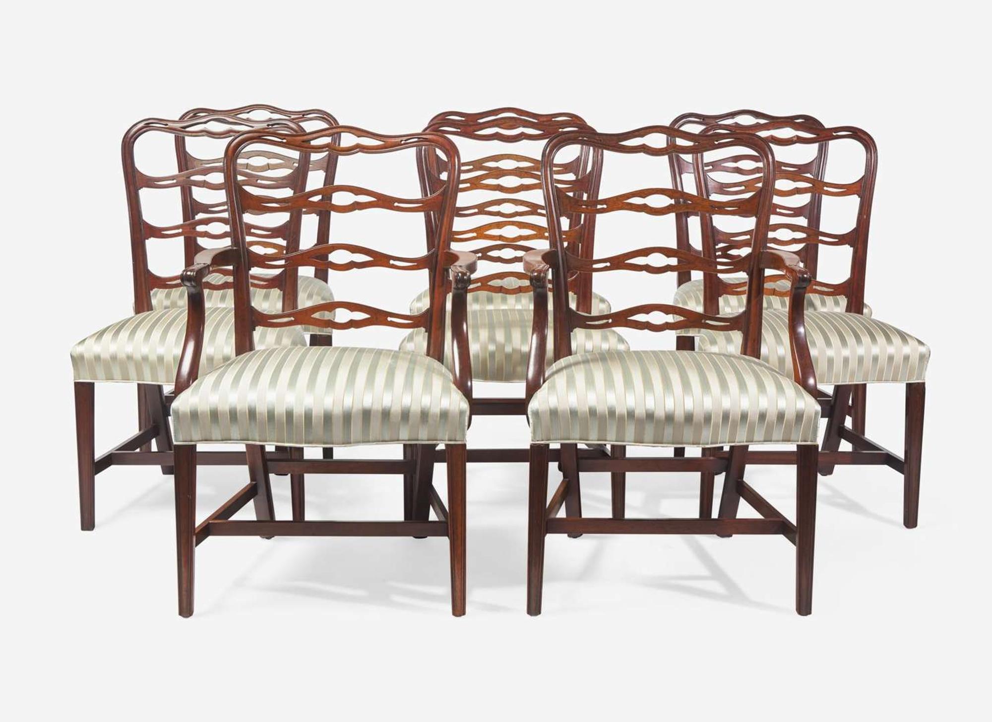 A set of eight Chippendale style mahogany ribbon-back dining chairs, 20th century