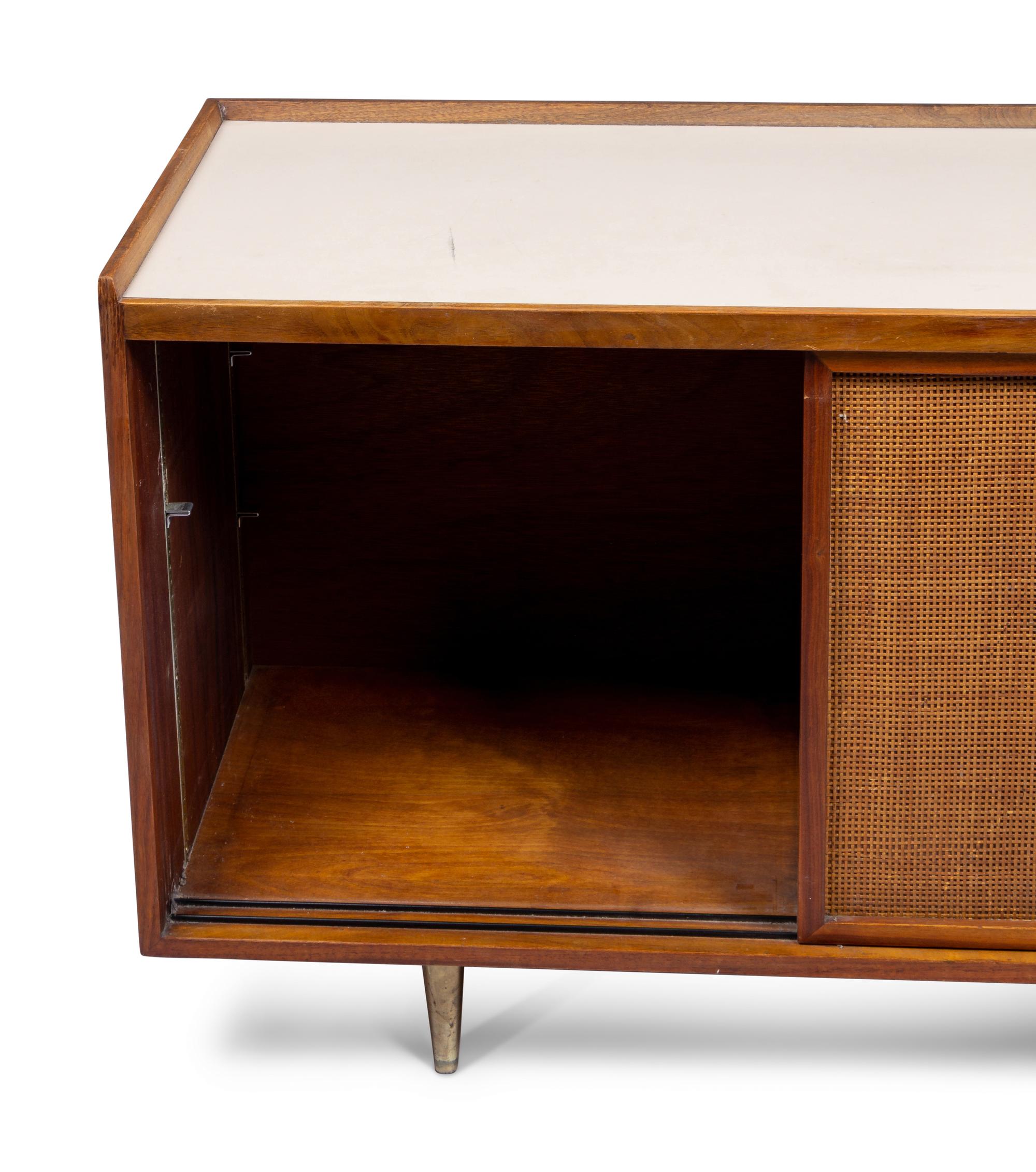 A Founders Furniture Co. Walnut, Caned and Laminte-Top Credenza