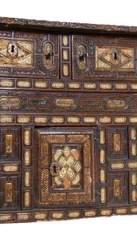 A Spanish Baroque Carved and Painted Walnut Chest