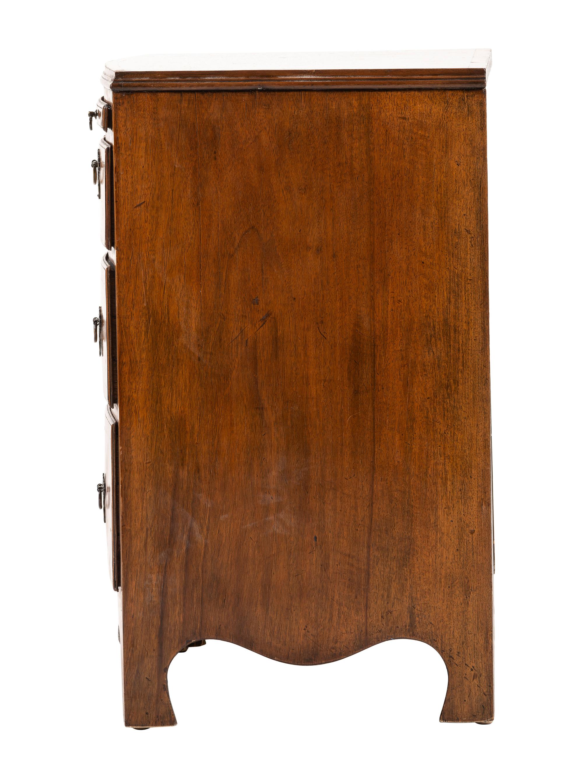 A George II-Style Walnut Four-Drawer Chest