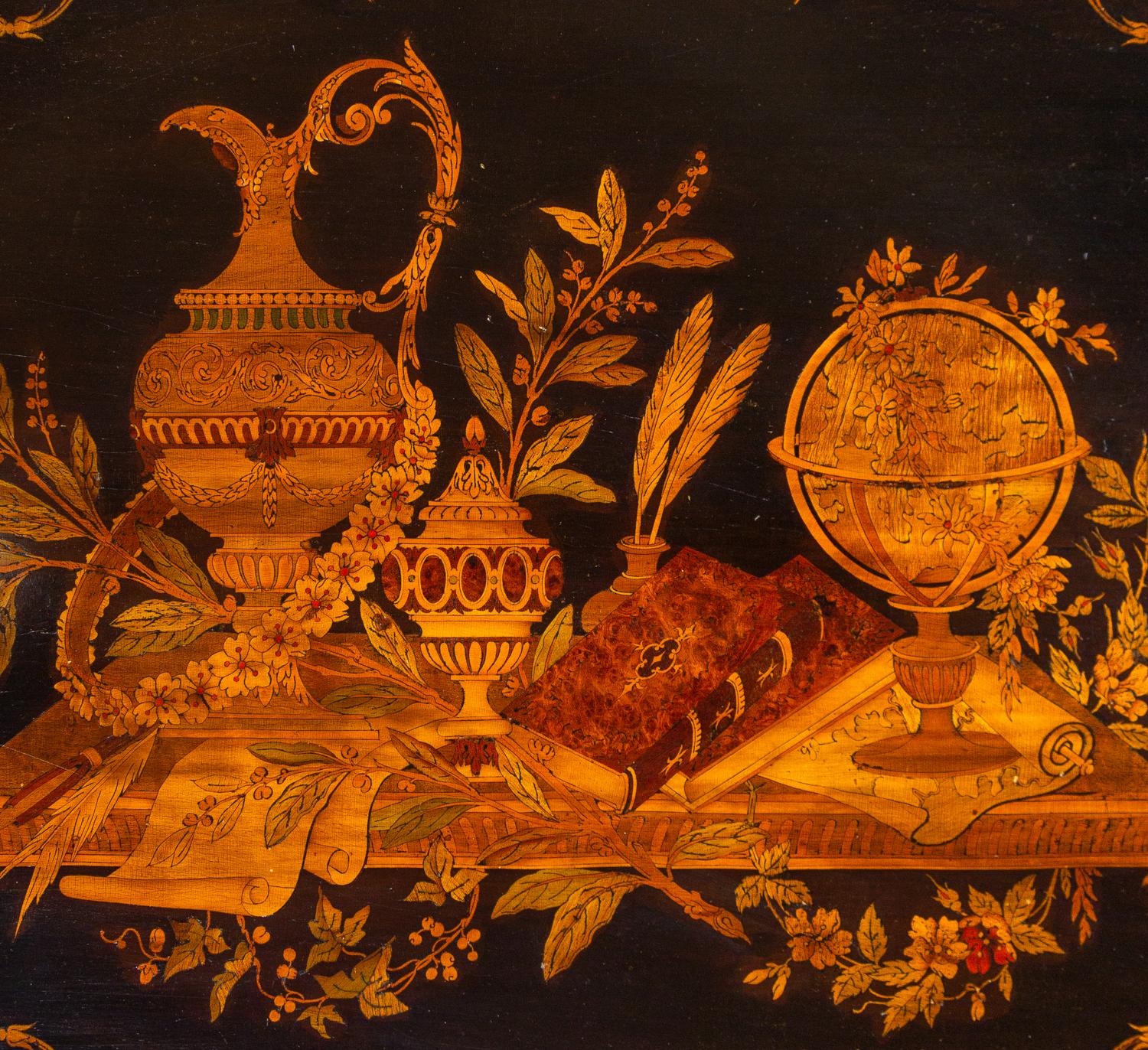A Victorian Carved, Inlaid and Painted Walnut Writing Desk