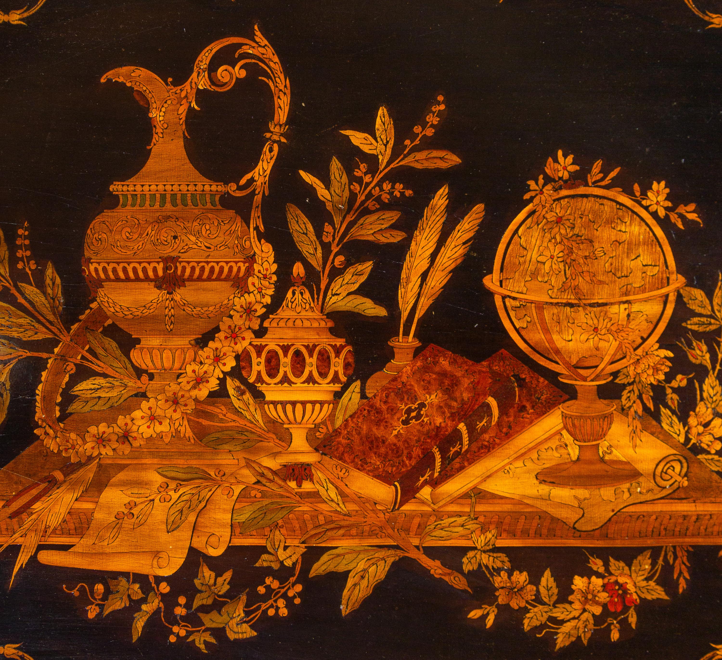 A Victorian Carved, Inlaid and Painted Walnut Writing Desk