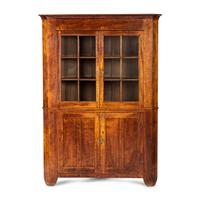A Chippendale Tiger Maple Corner Cupboard