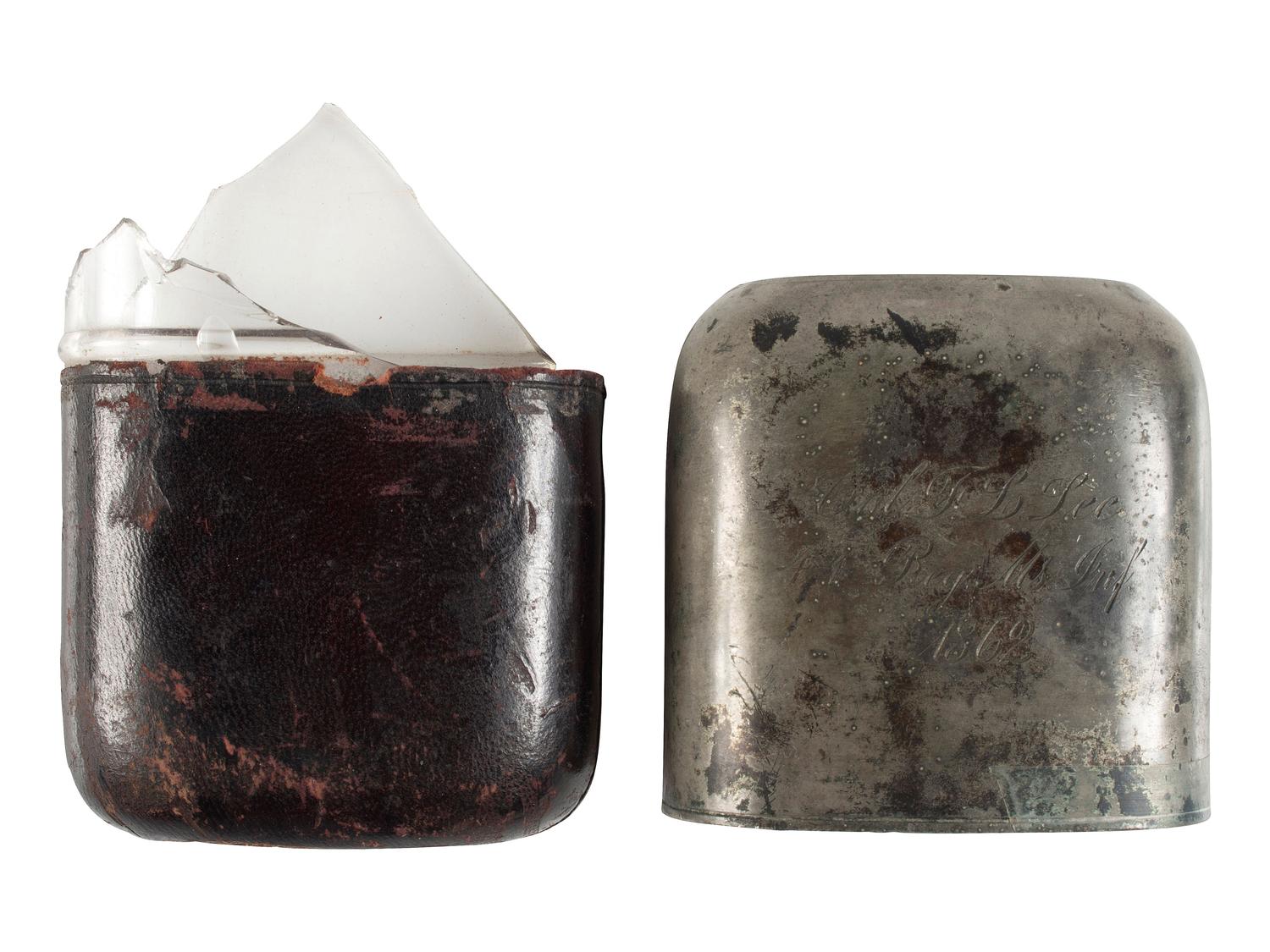 [CIVIL WAR]. Pewter, leather, and glass whiskey flask with engraved identification.