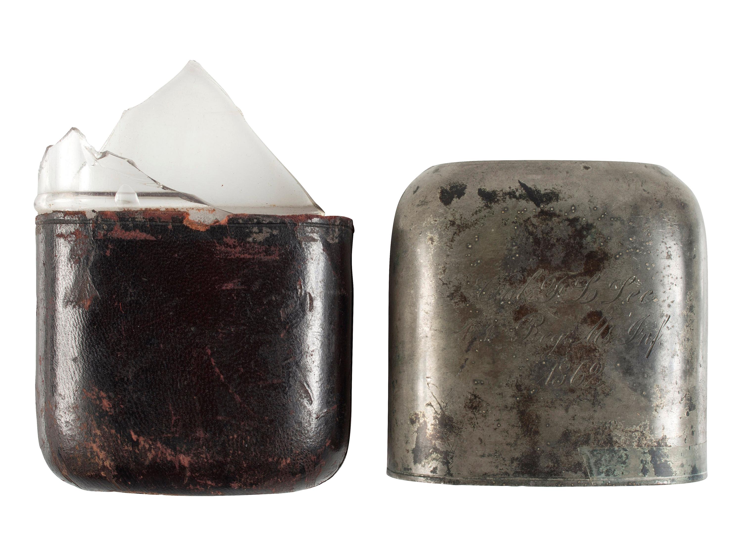 [CIVIL WAR]. Pewter, leather, and glass whiskey flask with engraved identification.