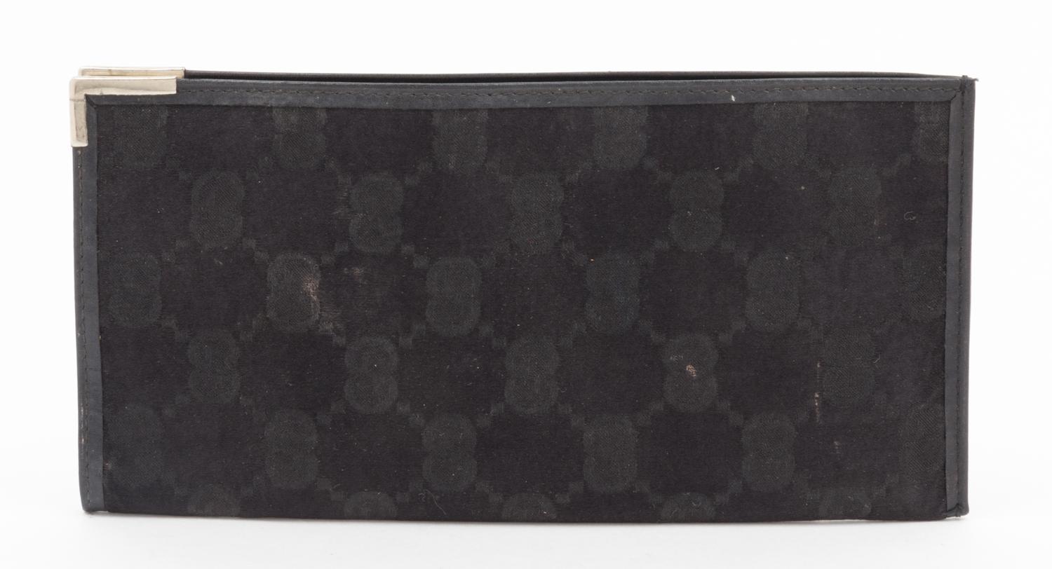 A Gucci Black Monogram Canvas Bill Fold, 6.5" x 3".