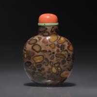 A Chinese Puddingstone Snuff Bottle, Qing Dynasty, Circa 1750-1860 — 1750-1860年 抱子石素面鼻煙壺