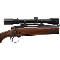 * Remington Model 700 Rifle with Burris Scope and Engraved Receiver