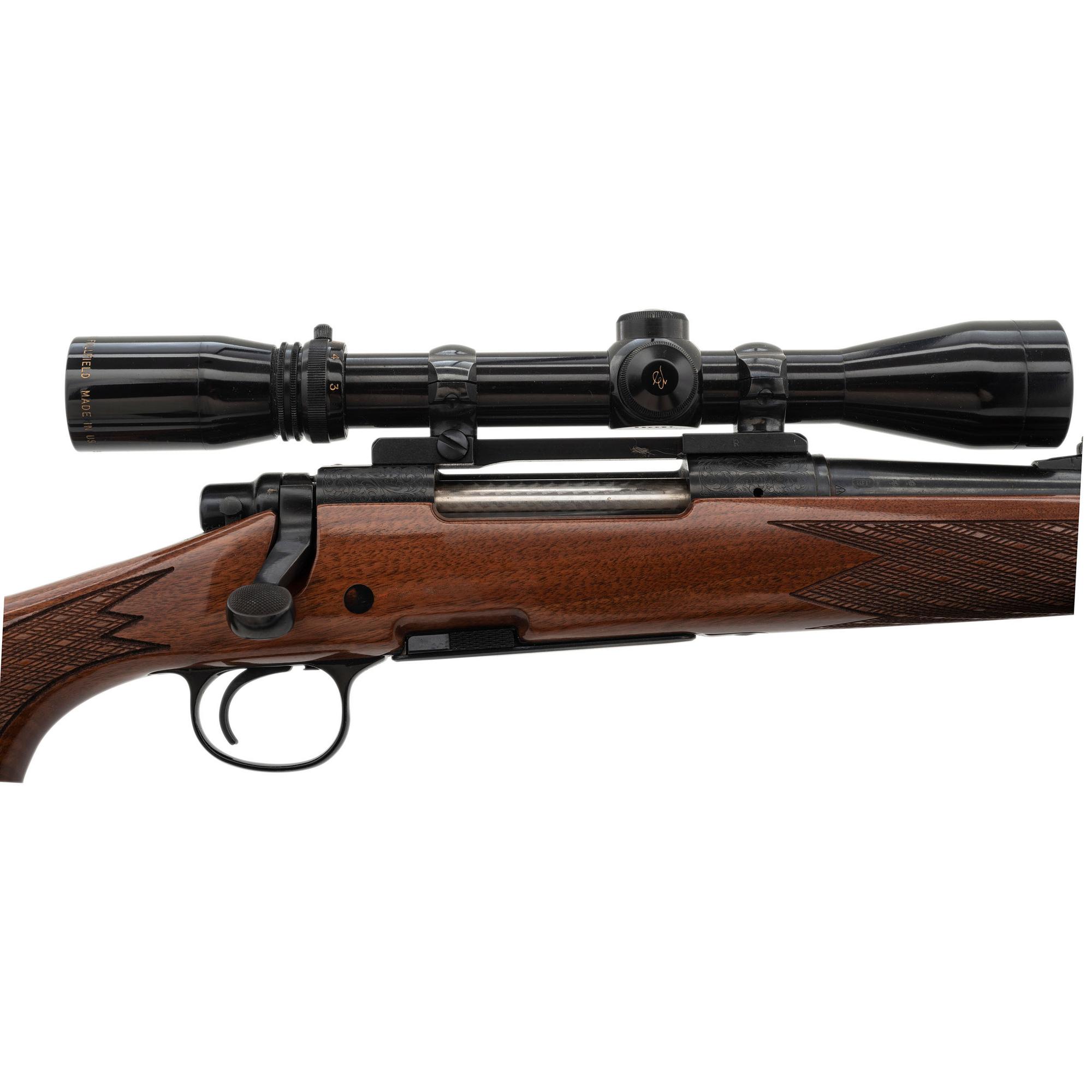* Remington Model 700 Rifle with Burris Scope and Engraved Receiver