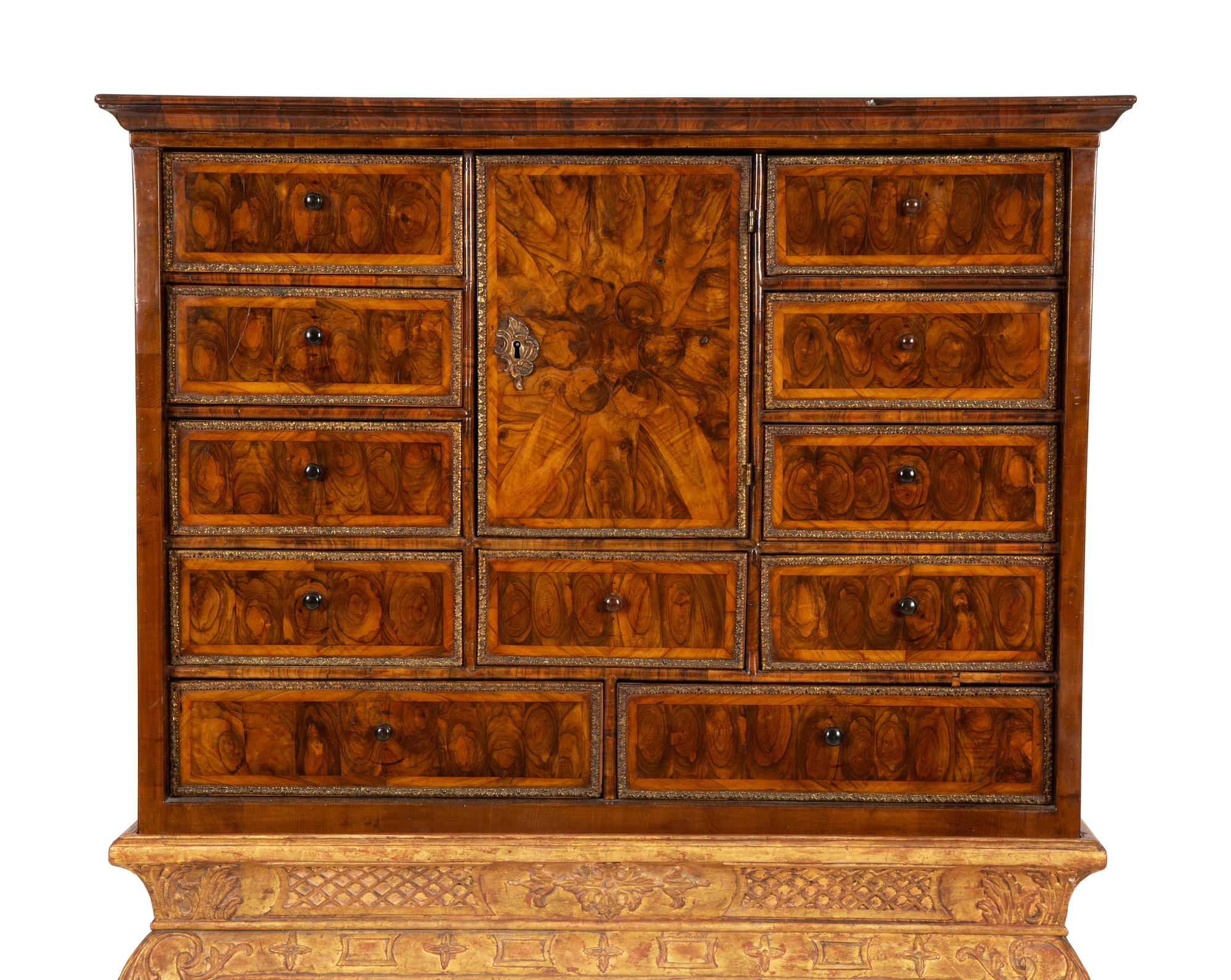 A William & Mary Style Cross-Banded Burlwood Cabinet on a Giltwood Stand