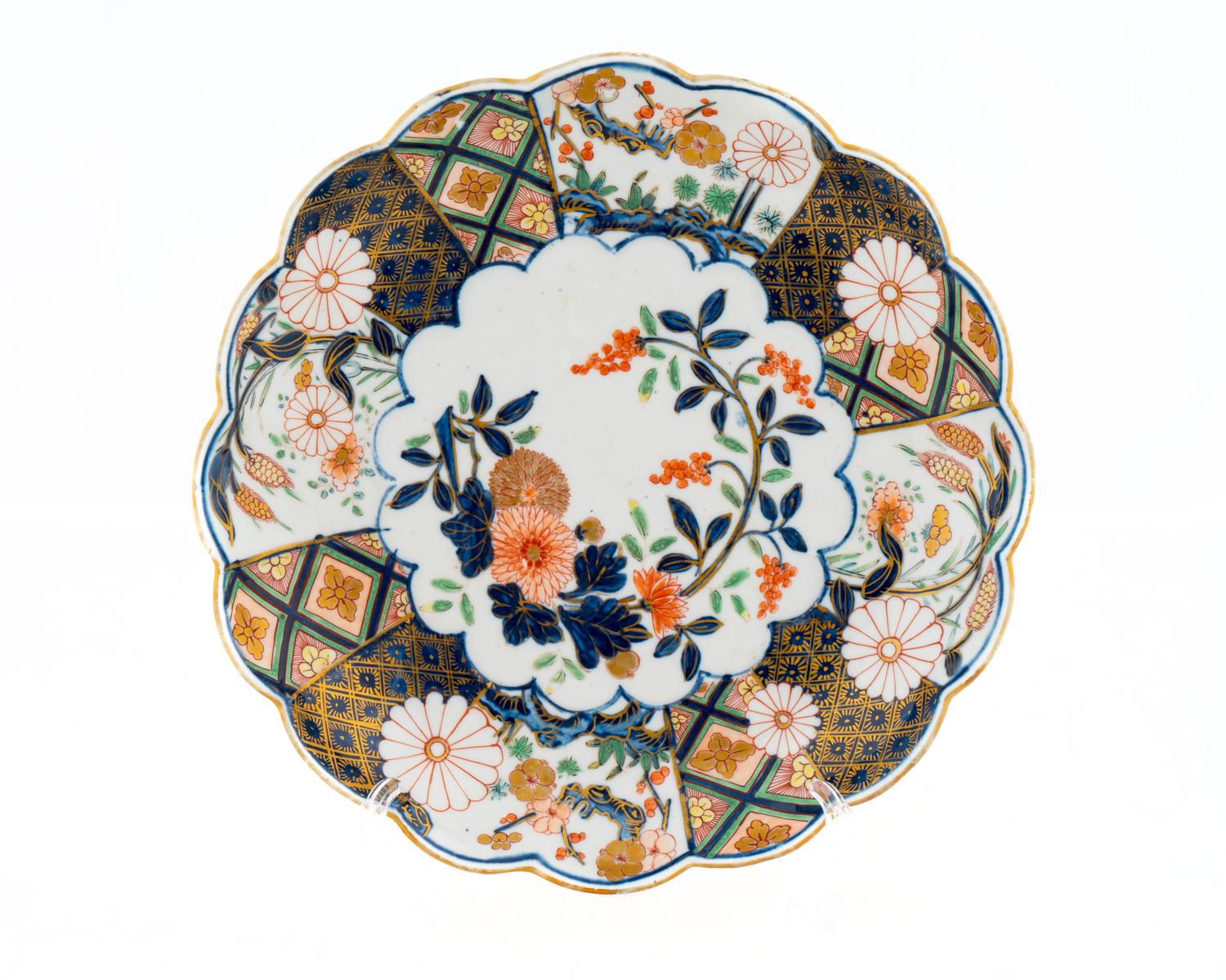 A Chelsea Porcelain Brocade Imari Plate — C. 1755