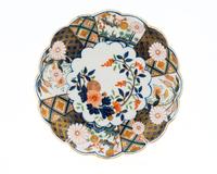 A Chelsea Porcelain Brocade Imari Plate — C. 1755