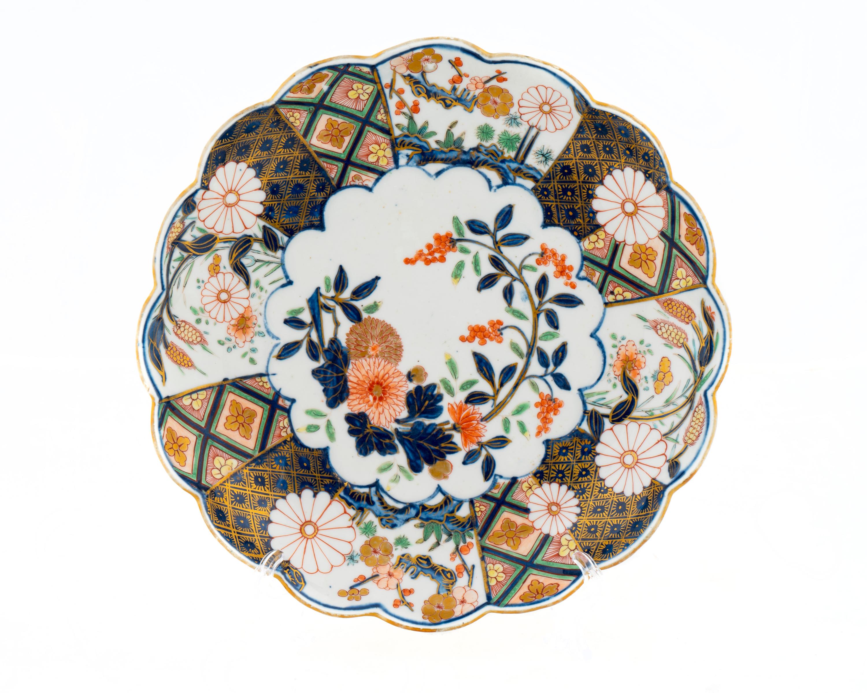 A Chelsea Porcelain Brocade Imari Plate — C. 1755